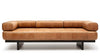 Ein hellbraunes Ledersofa von Desede Switzerland mit Patchwork-Design und schwarzen Beinen.