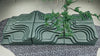 Grünes Ledersofa von Desede Switzerland mit organischen Formen und modularer Funktion.