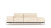 Helle Lederchaiselongue von Desede Switzerland mit schwarzem Gestell und Edelstahlfüßen.