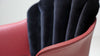Roter Lederstuhl mit schwarzer Samtpolsterung von Desede Switzerland, elegantes Design.