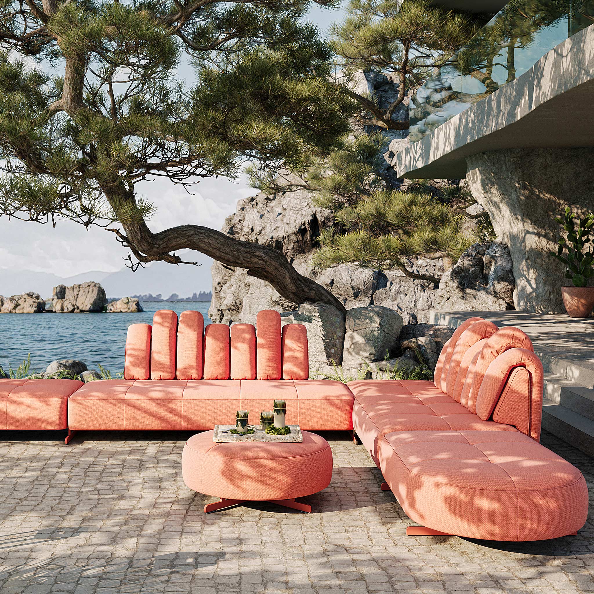 Desede Switzerland präsentiert ein modulares, orangefarbenes Outdoor-Sofa aus Stoff mit einzigartigem Design.